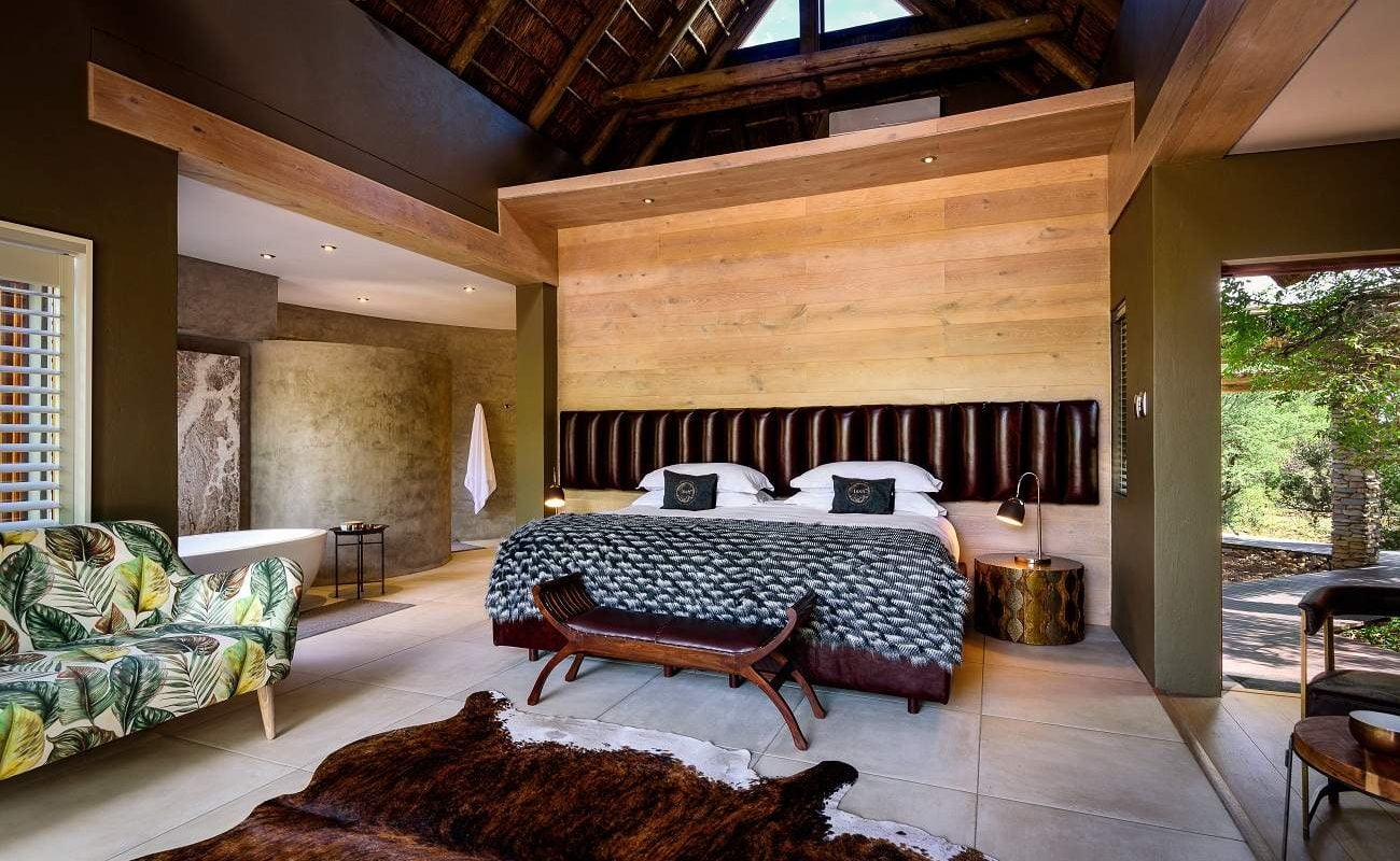 Schlafzimmer einer Suite in Lush