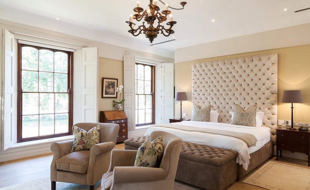Schlafzimmer einer Suite im Lanzerac Hotel & Spa