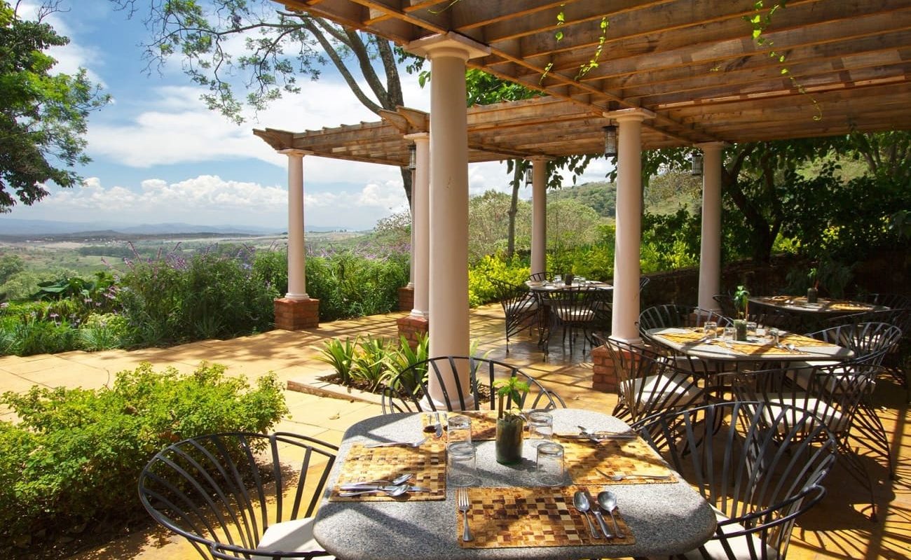 Veranda des Haupthauses der Gibb's Farm